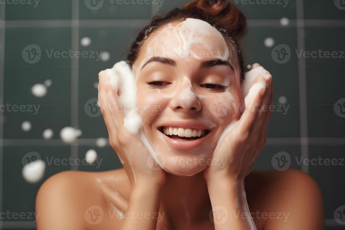 Closeup portrait of young woman cleanses the skin with foam on her face in bathroom. photo