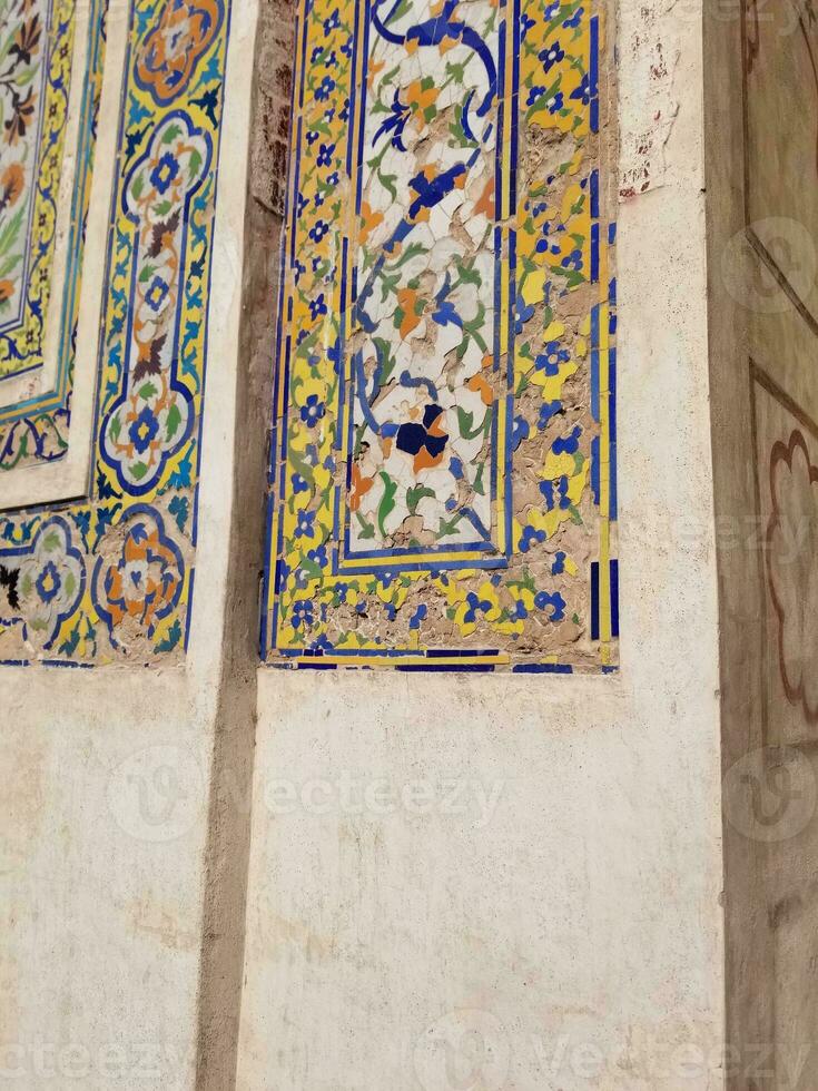 The conserved picture wall in Badshahi fort close picture of wall texture photo