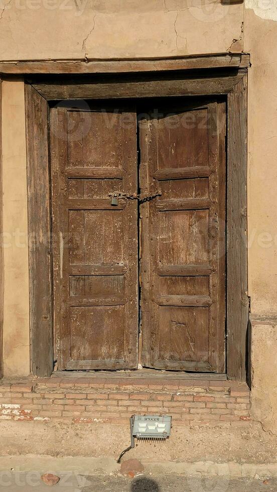 Old wood texture door at lahore fort photo