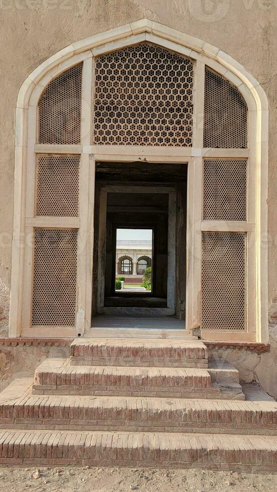 Beautiful old design door in Lahore fort photo