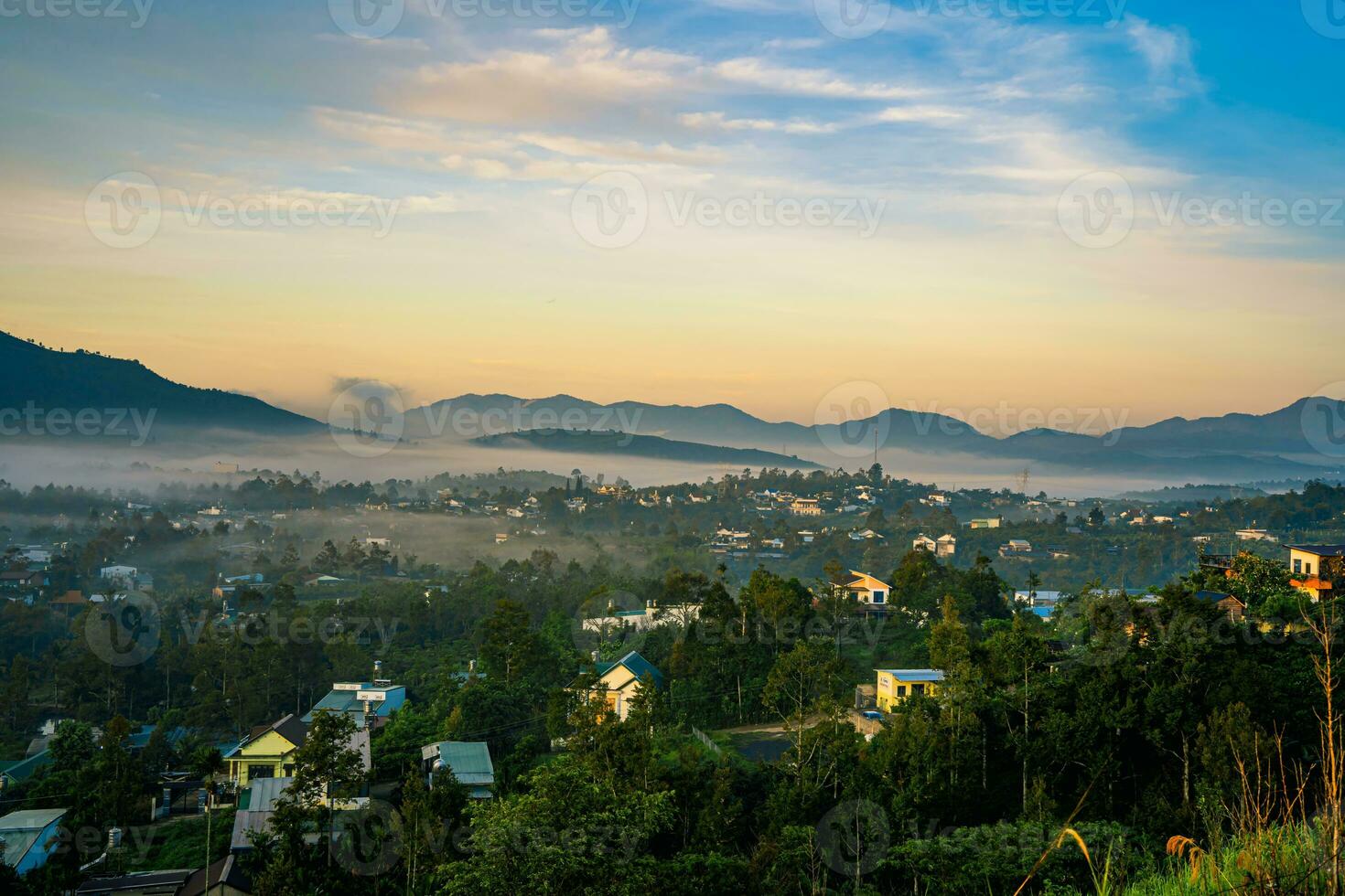 Mountains during dawn. Beautiful natural landscape in the summer time with fog photo