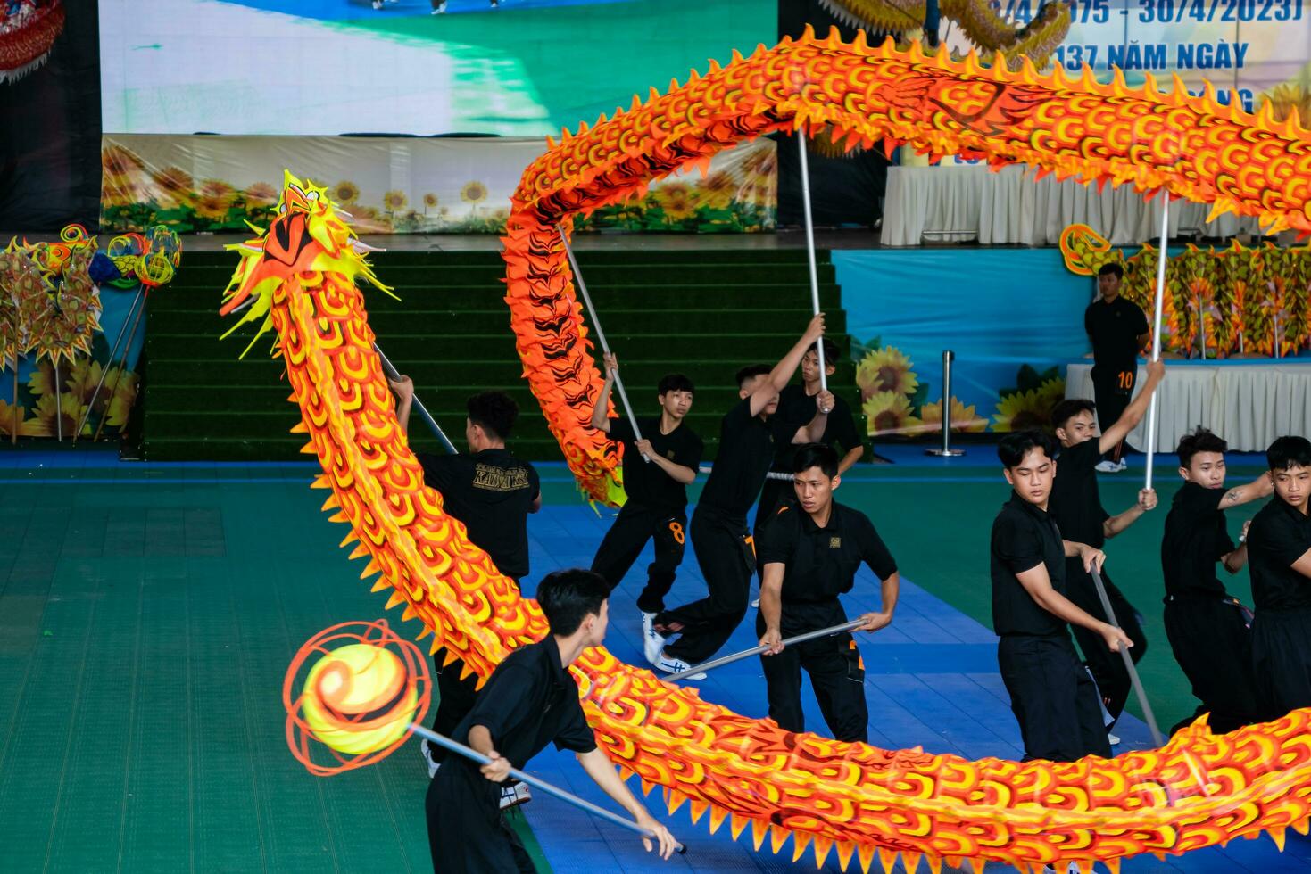 Ho Chi Minh, Viet Nam - 22 April 2023 Dragon dance, celebrate the new year. At the park photo