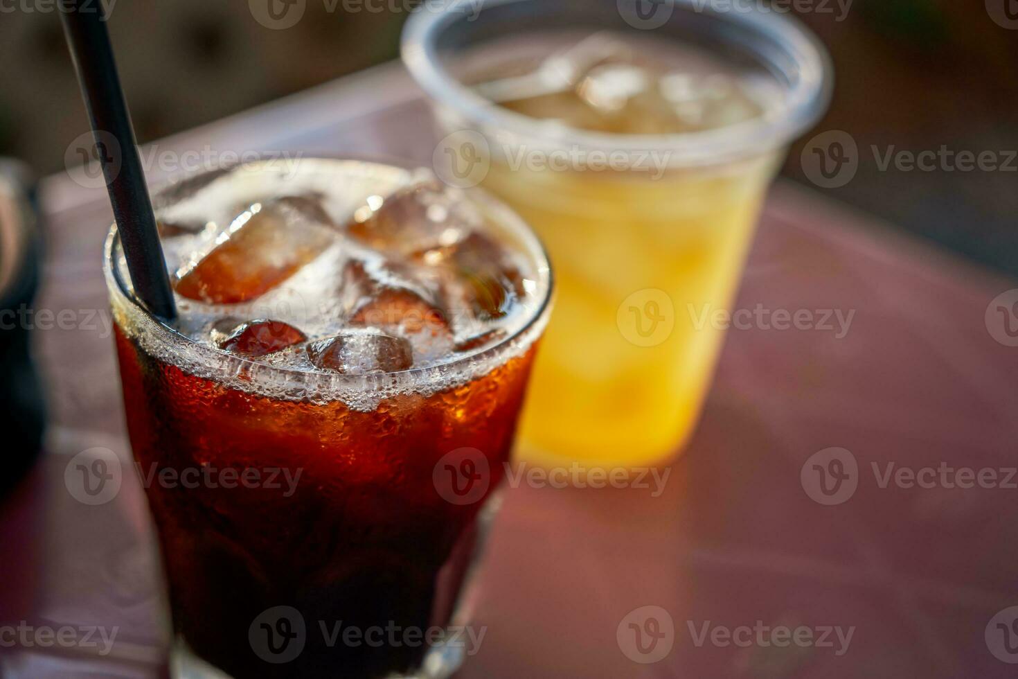 Delicious ice coffee americano on table. photo