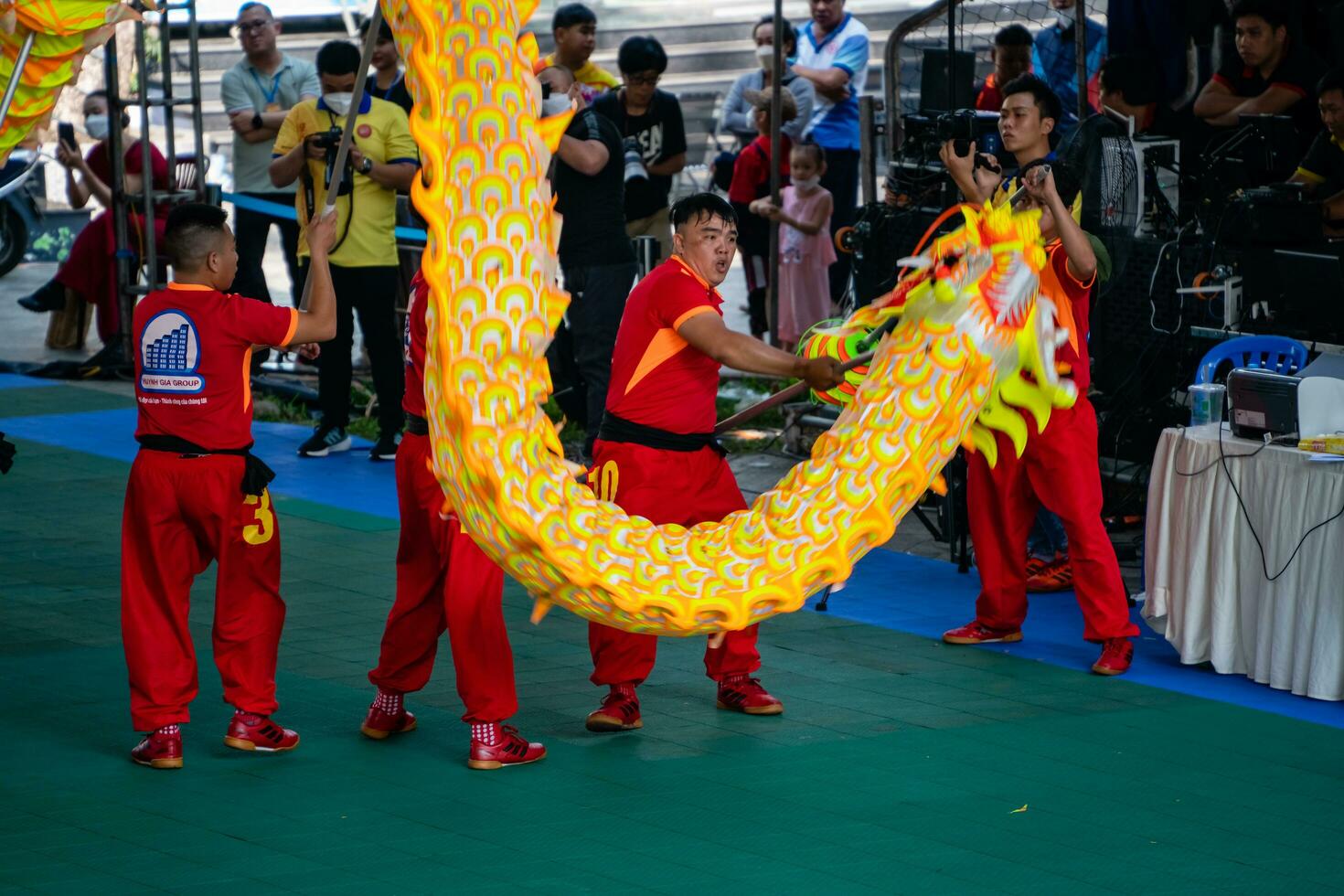 Ho Chi Minh, Viet Nam - 22 April 2023 Dragon dance, celebrate the new year. At the park photo