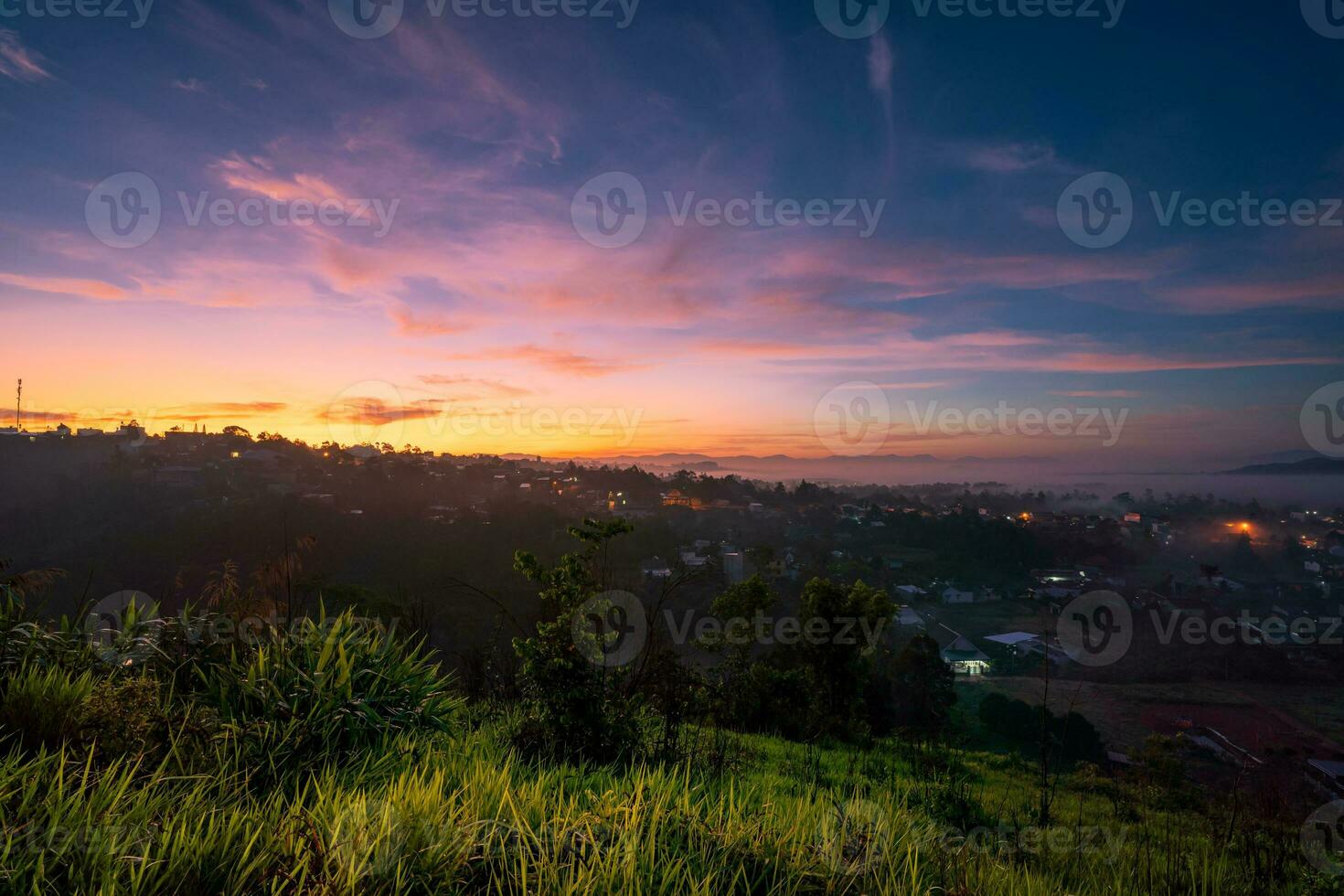 Mountains during dawn. Beautiful natural landscape in the summer time with fog photo