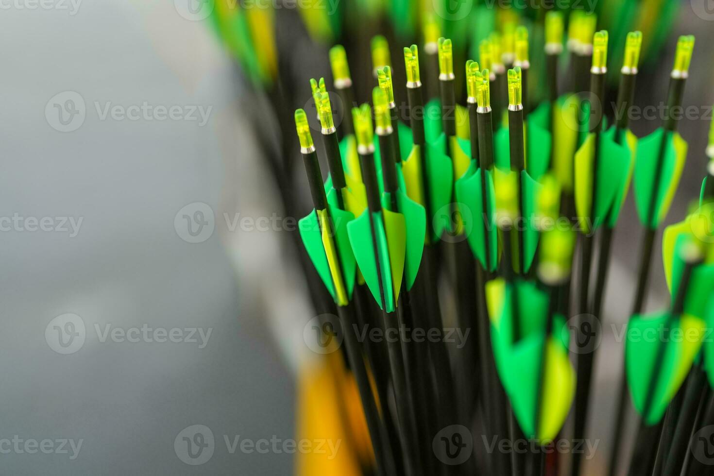 Colorful group of archery arrows shows fletching which are plastic vanes photo