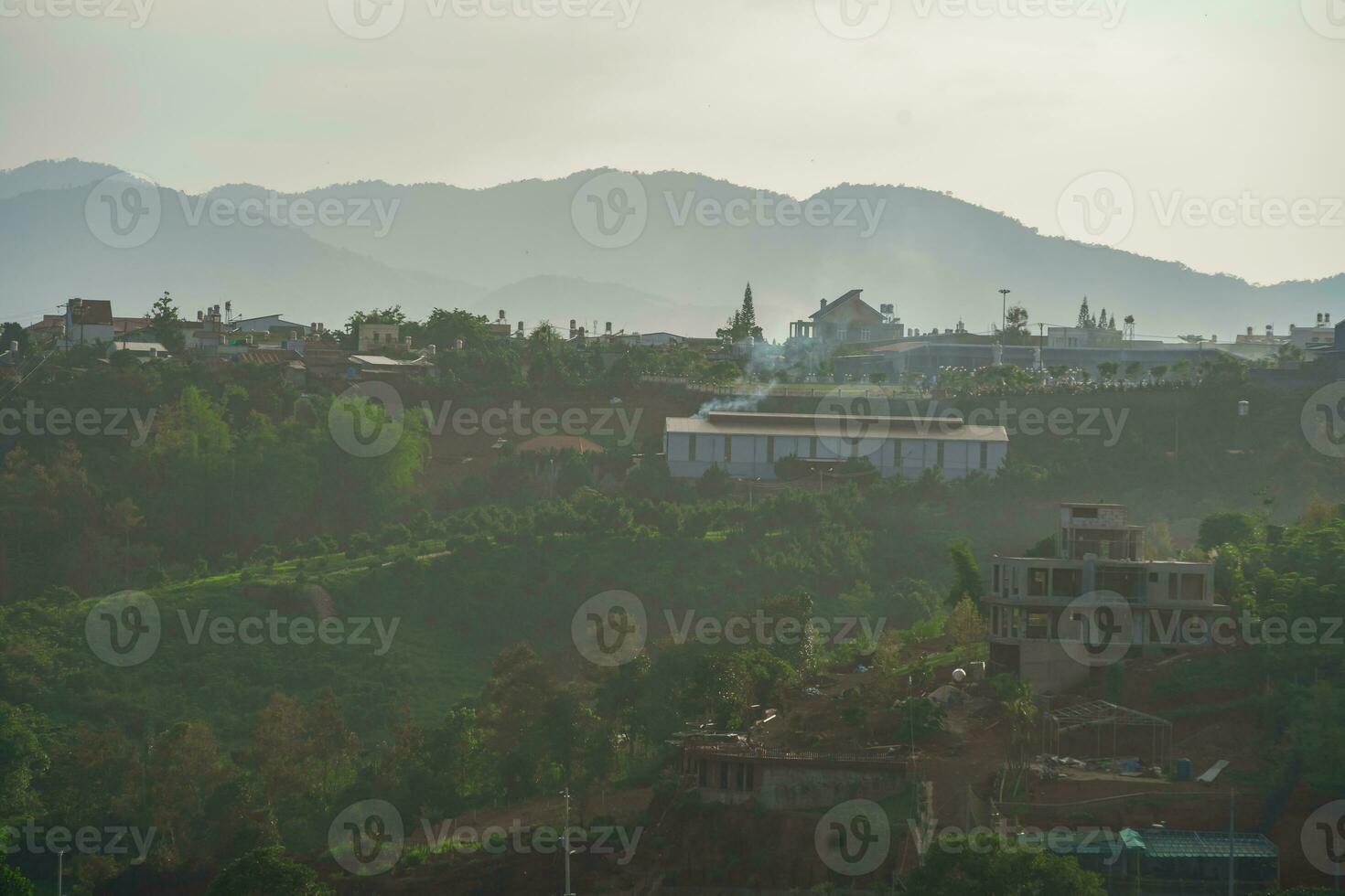 Majestic sunset in the mountain landscape in Dai Binh mountain valley, Vietnam photo