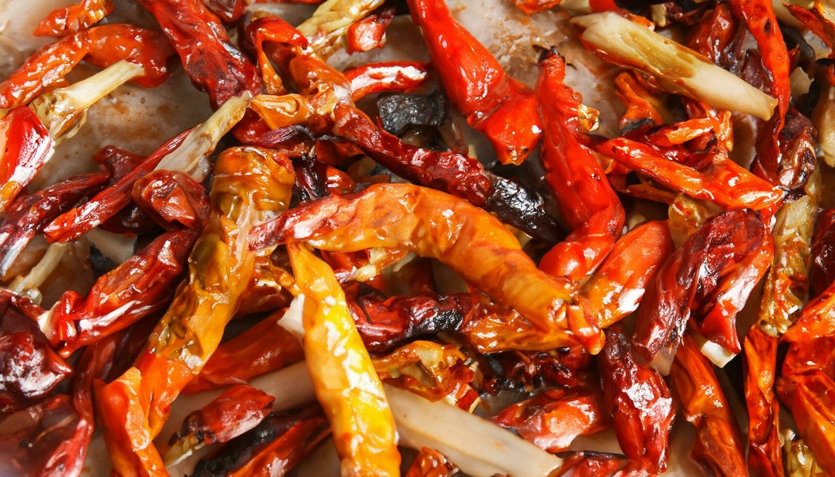 A close up of a pan of cooked peppers photo
