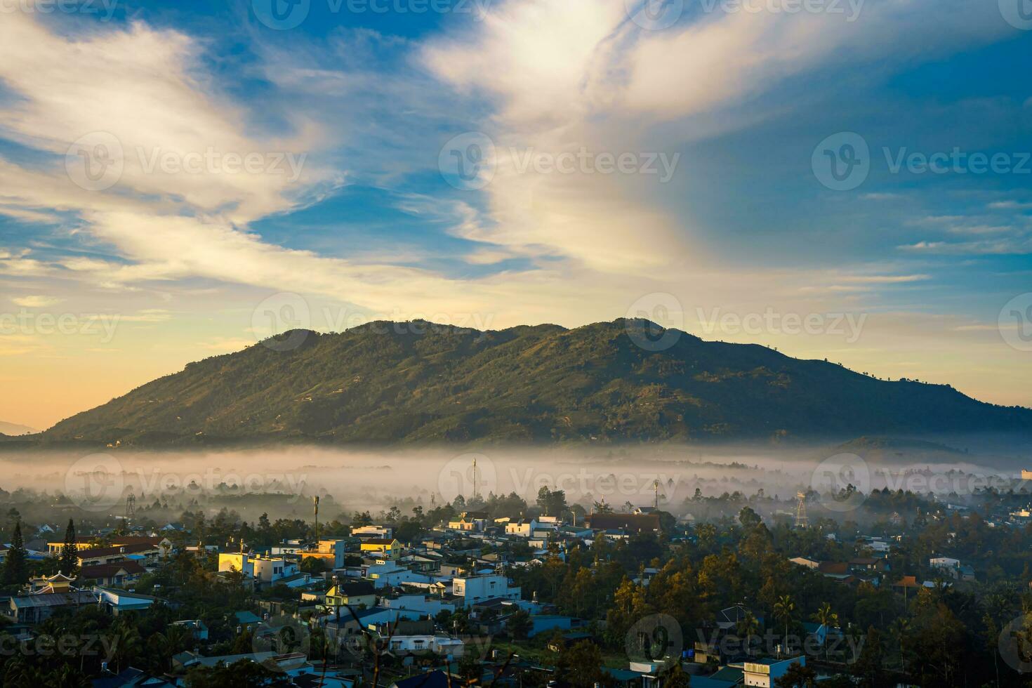 Mountains during dawn. Beautiful natural landscape in the summer time with fog photo