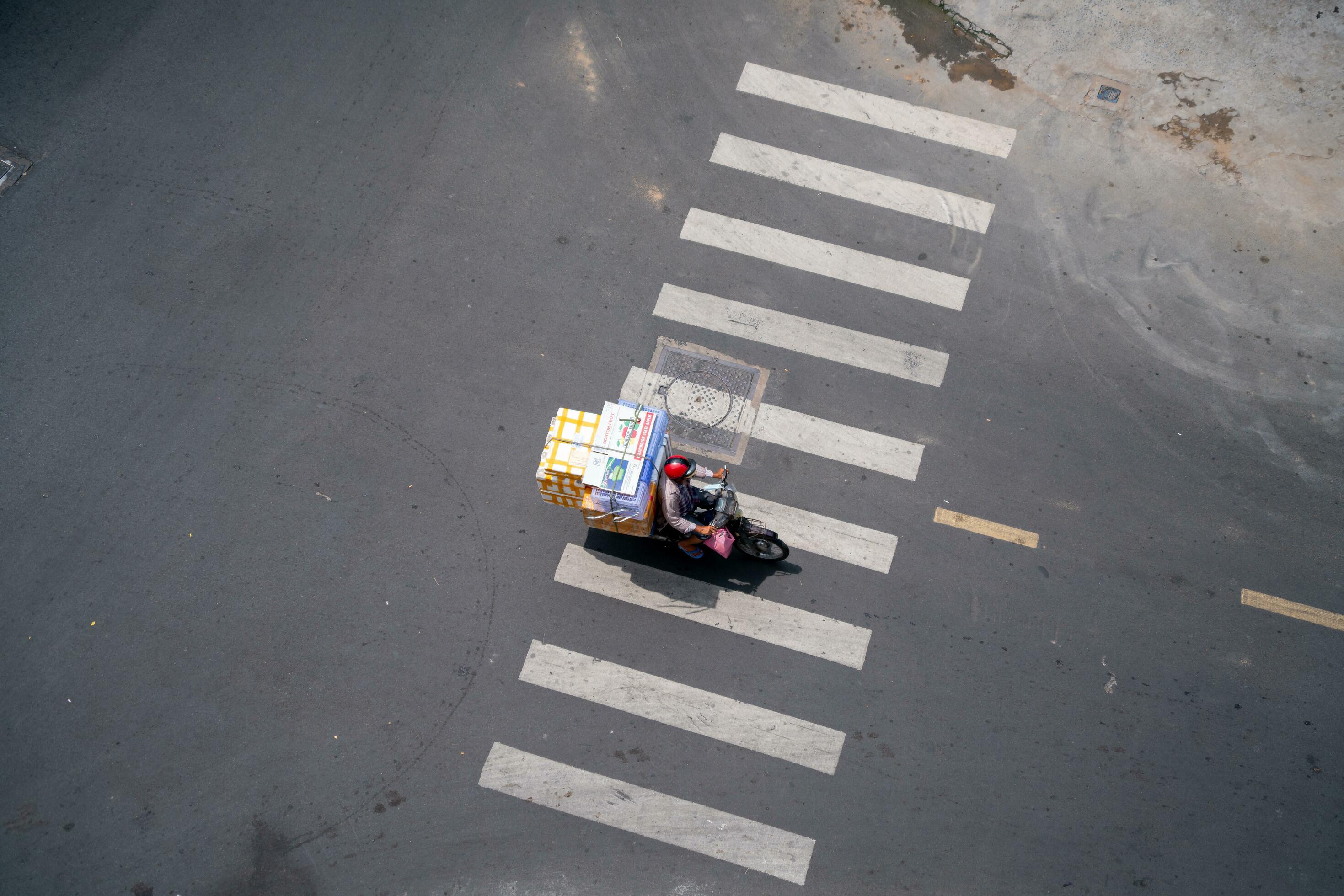 Crossing the road in Ho Chi Minh City, Vietnam 