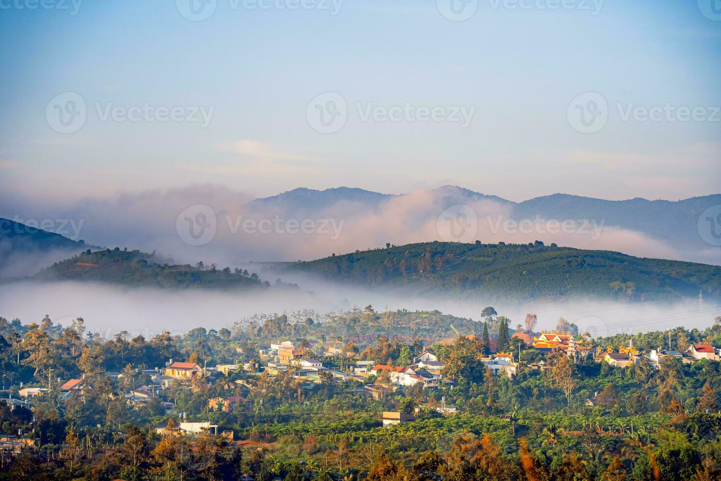 Mountains during dawn. Beautiful natural landscape in the summer time with fog photo