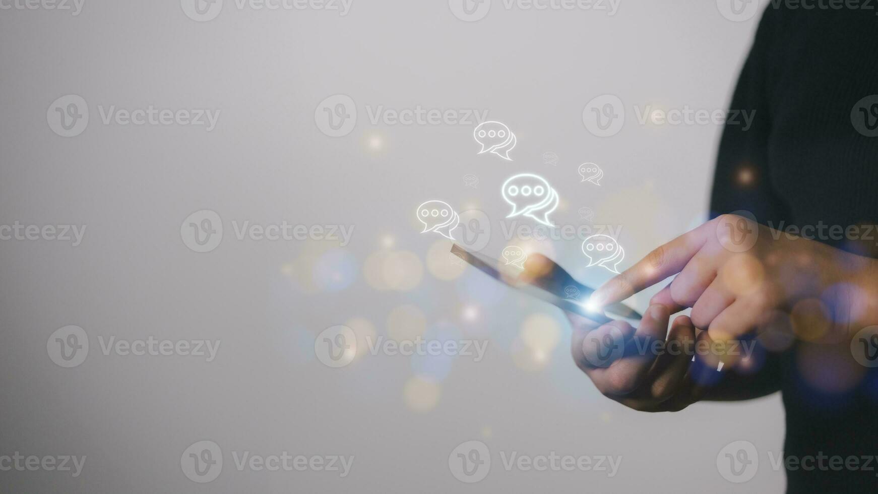 Live chat chatting and social network concepts, Close-up hands using mobile smartphone with chat box icons photo