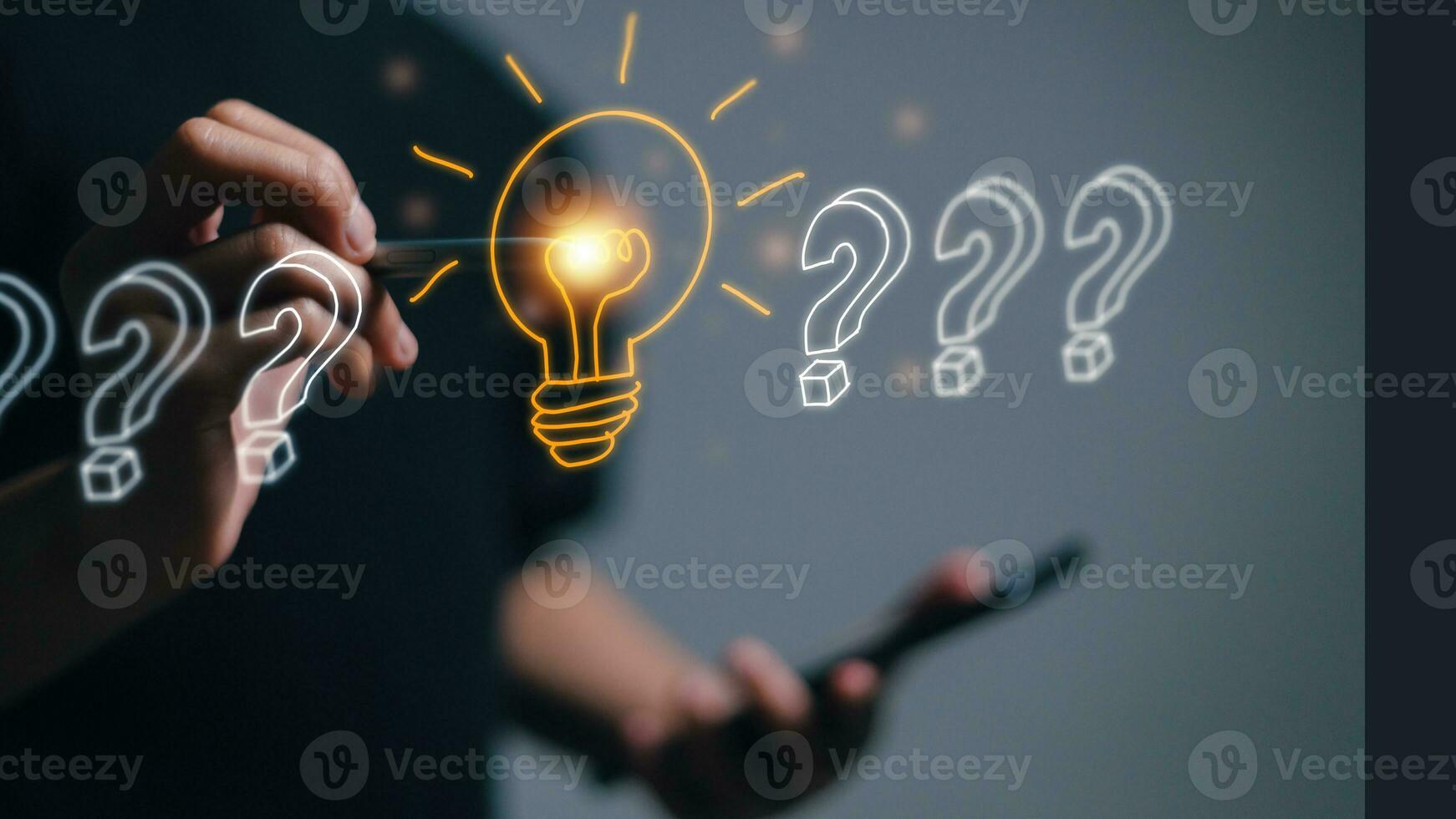 The process of problem solving or idea formation. Question mark and light bulb icons. women draw light bulbs idea concepts. photo