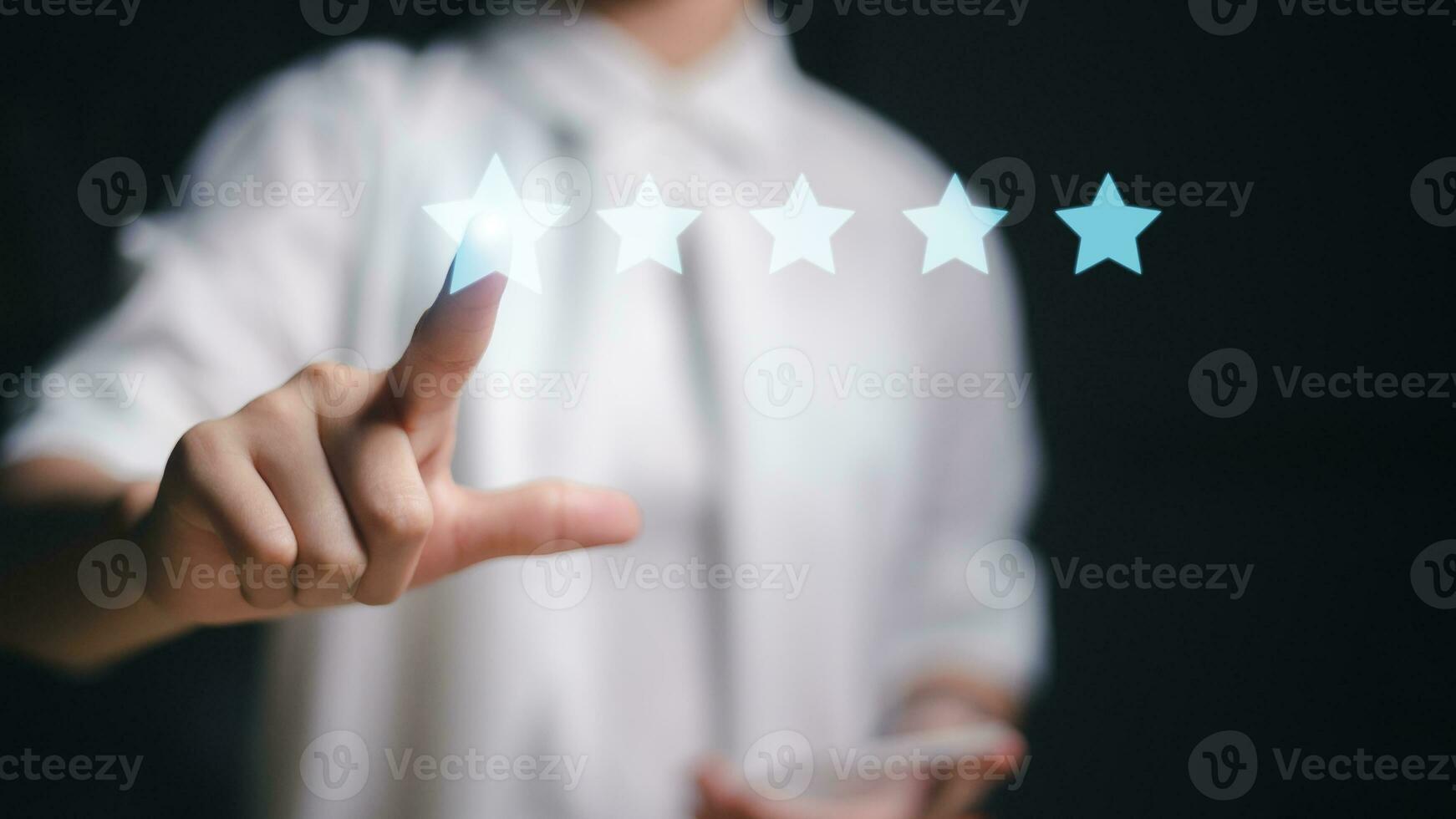 Businesswoman pointing five stars to increase. Customer review satisfaction feedback survey concept. photo