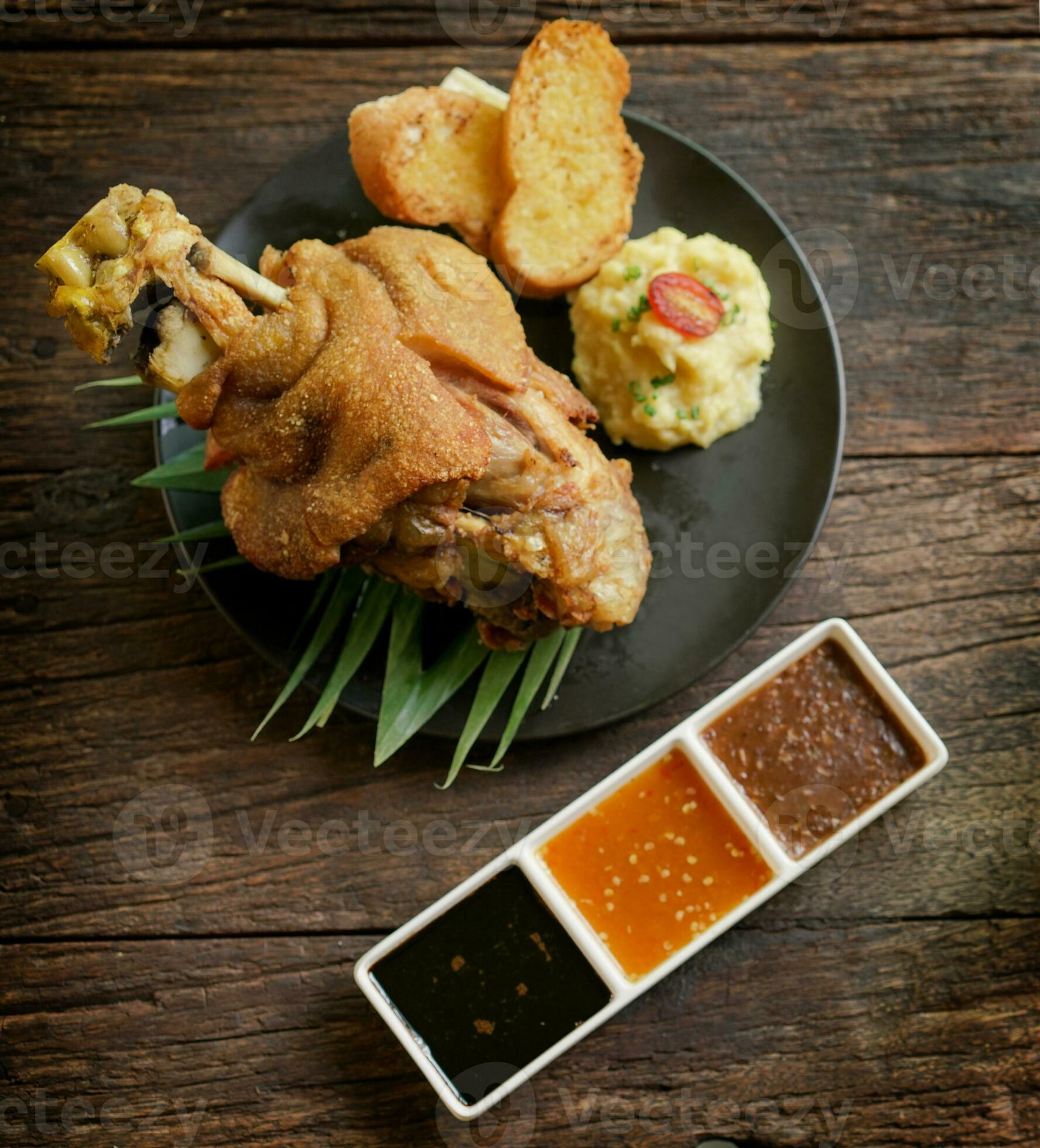 Crispy German Pork Knuckle with Beer Gravy 24869046 Stock Photo at Vecteezy