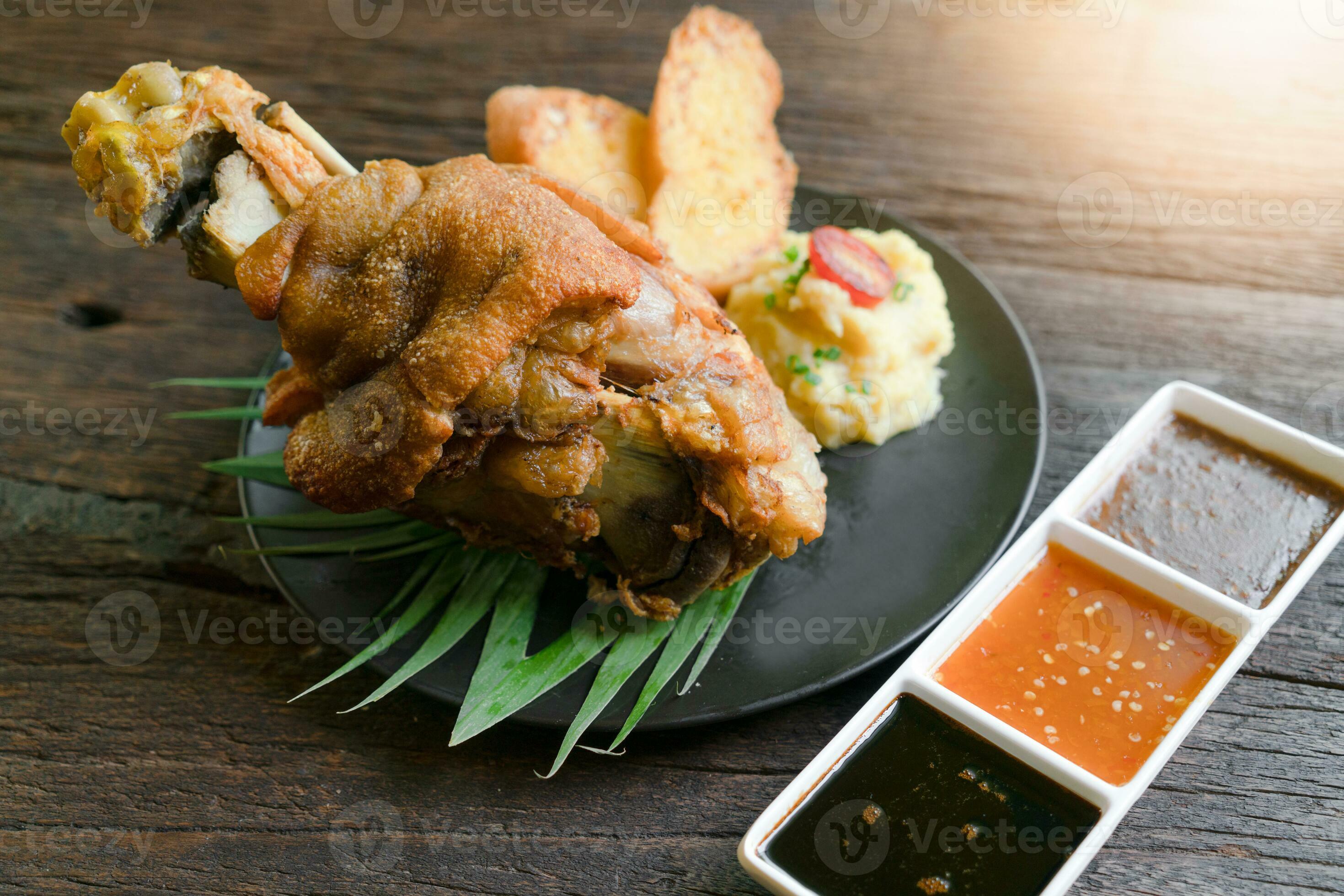 Crispy German Pork Knuckle with Beer Gravy 24869051 Stock Photo at Vecteezy