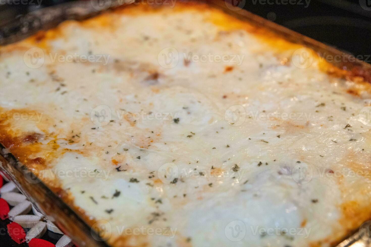 Lasagna in a casserole dish photo