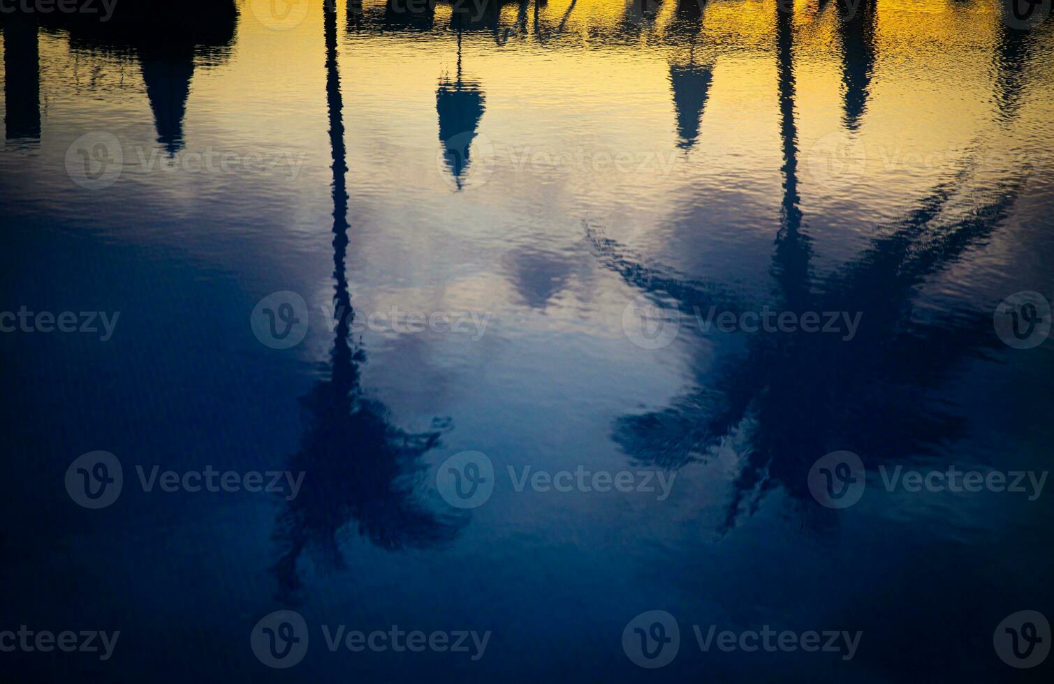 Sunrise Reflection on a Pool photo
