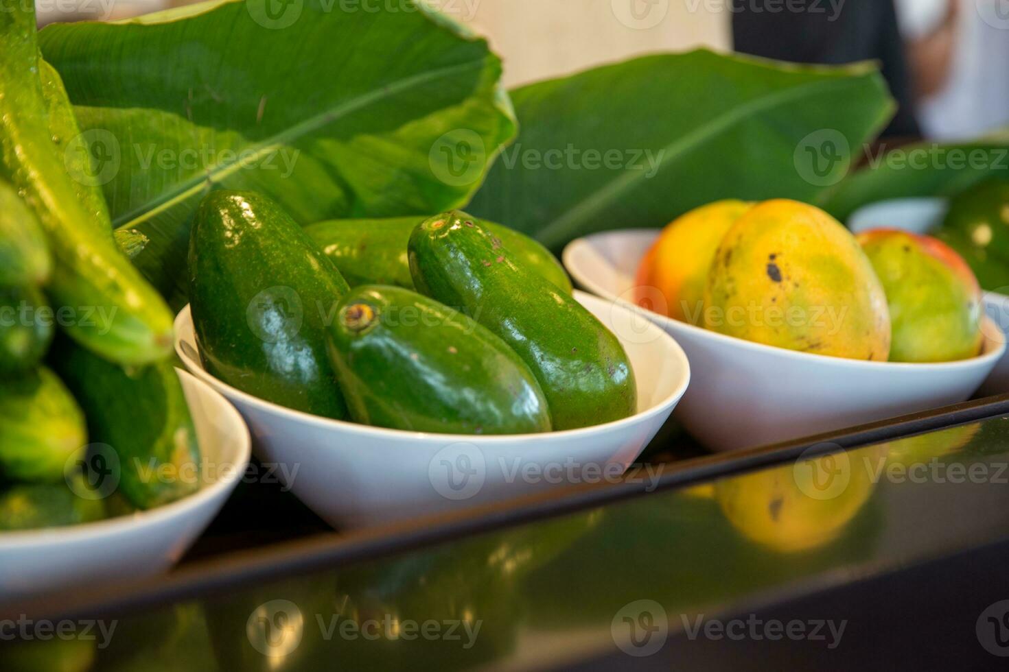 Mangos, avocados and cucumbers photo