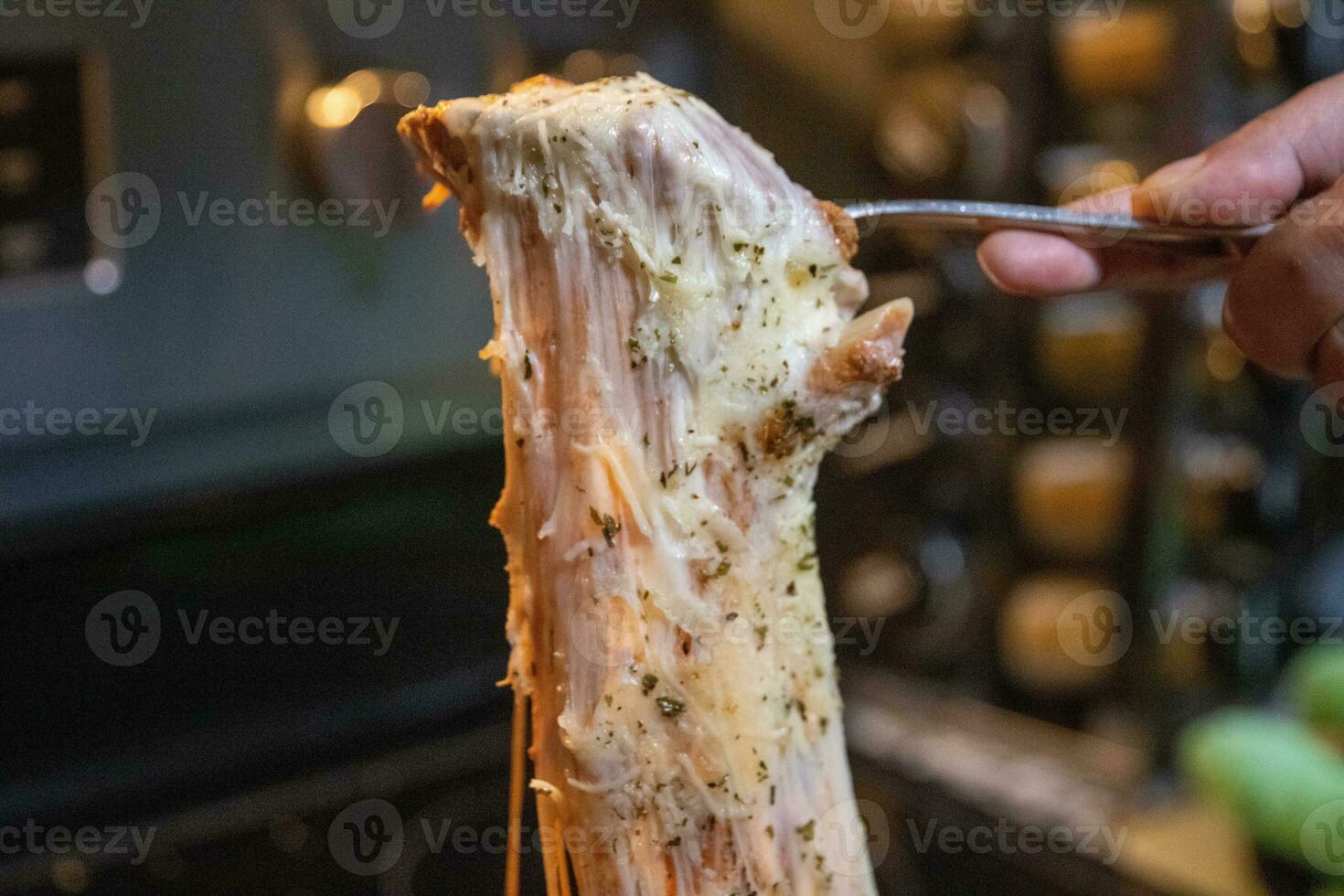 Spoonful of cheesy baked ziti photo