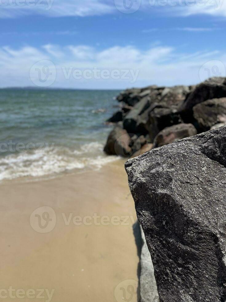 Rockwall at a beach photo