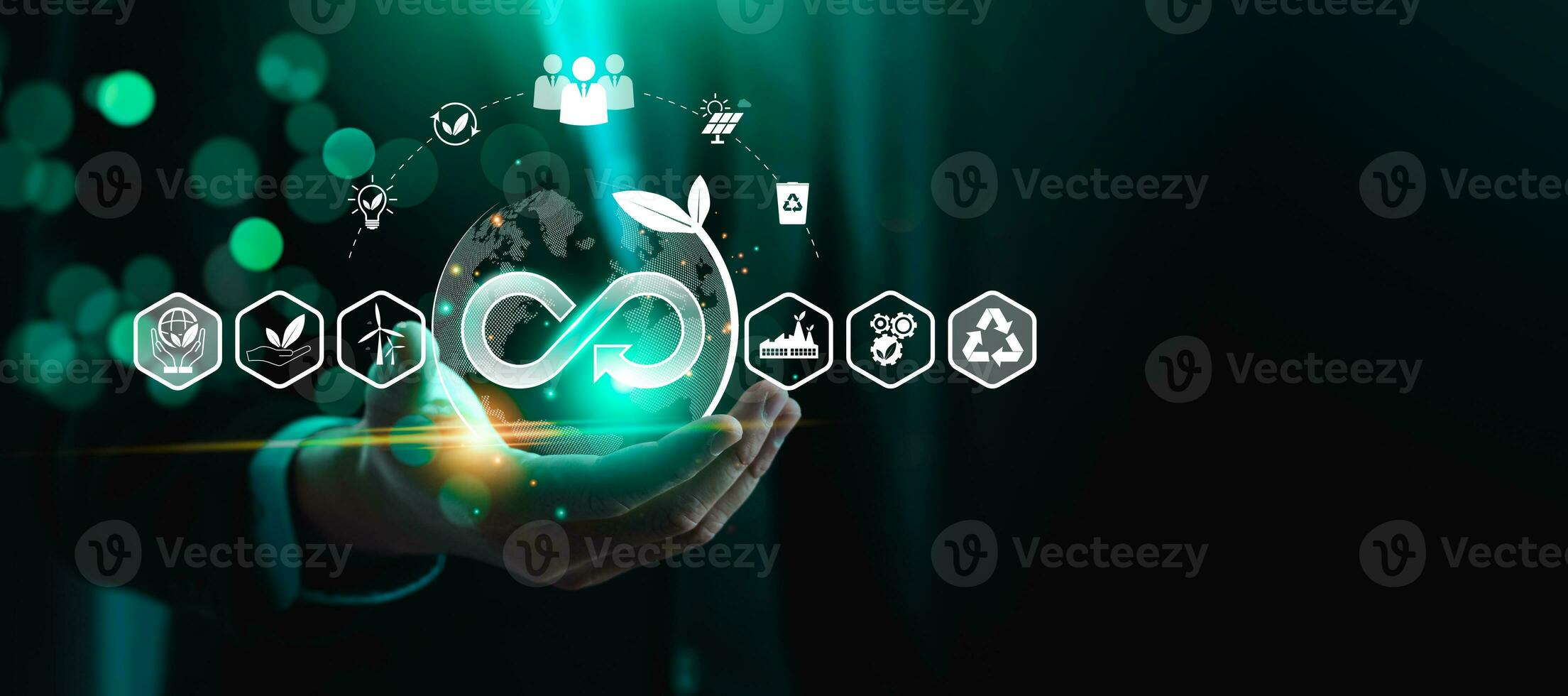 Businessman hold circular economy icon. economic system that aims to minimize waste and maximize resource efficiency, sustainable strategies to eliminate waste and pollution for future business growth photo