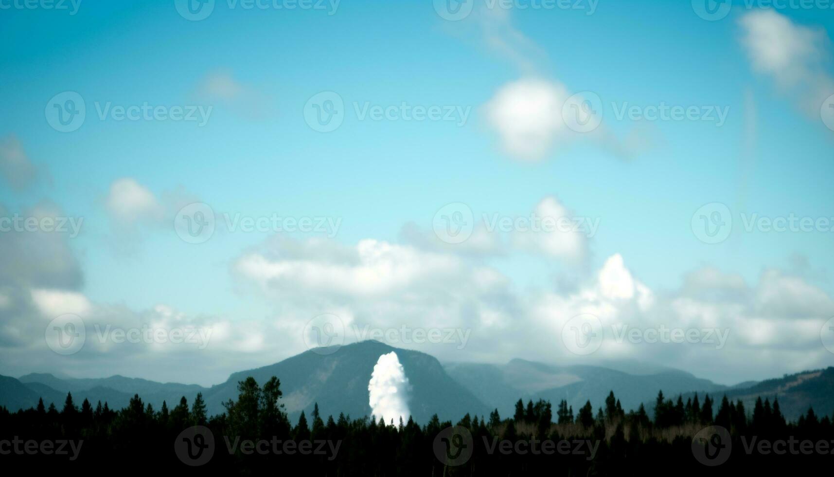 Majestic mountain range silhouette, blue sky, tranquil scene, nature beauty generated by AI photo