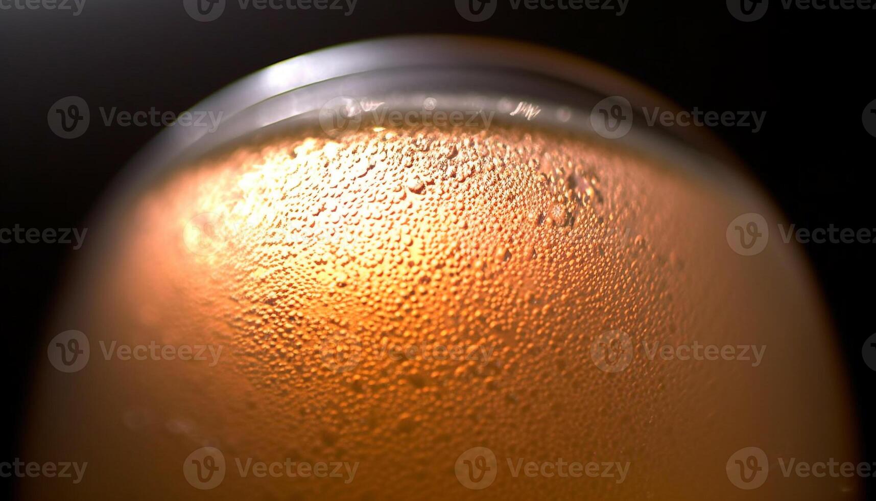 Golden beer glass with bubbles and condensation on black background generated by AI photo