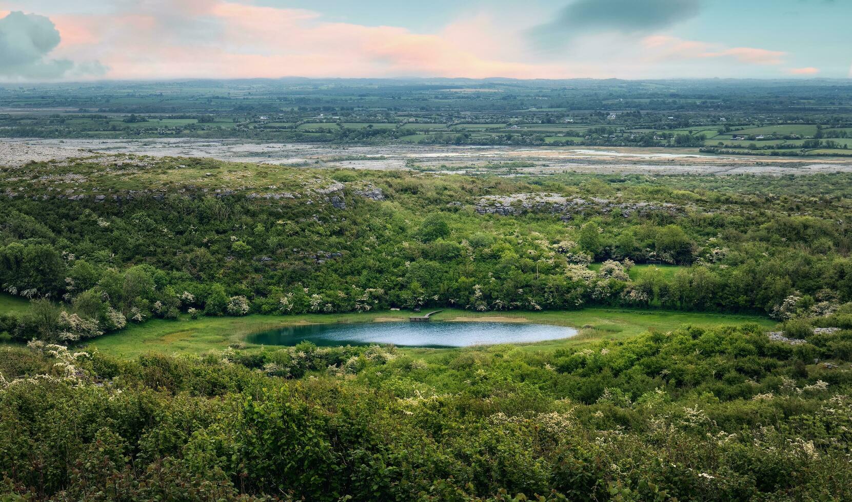 beautiful landscape scenery with mountain lake lough avalla at Burren National Park in county Clare, Ireland photo