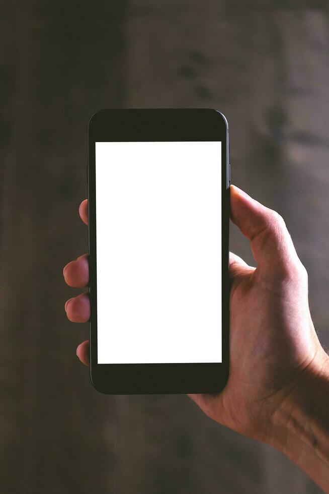 Cropped Shot View of Man or Women Hands Holding Smart Phone Mockup v14.0 photo