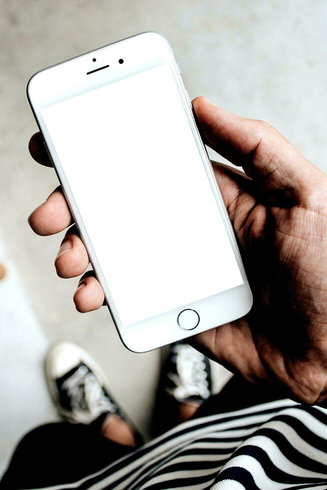 Cropped Shot View of Man or Women Hands Holding Smart Phone Mockup v15.0 photo