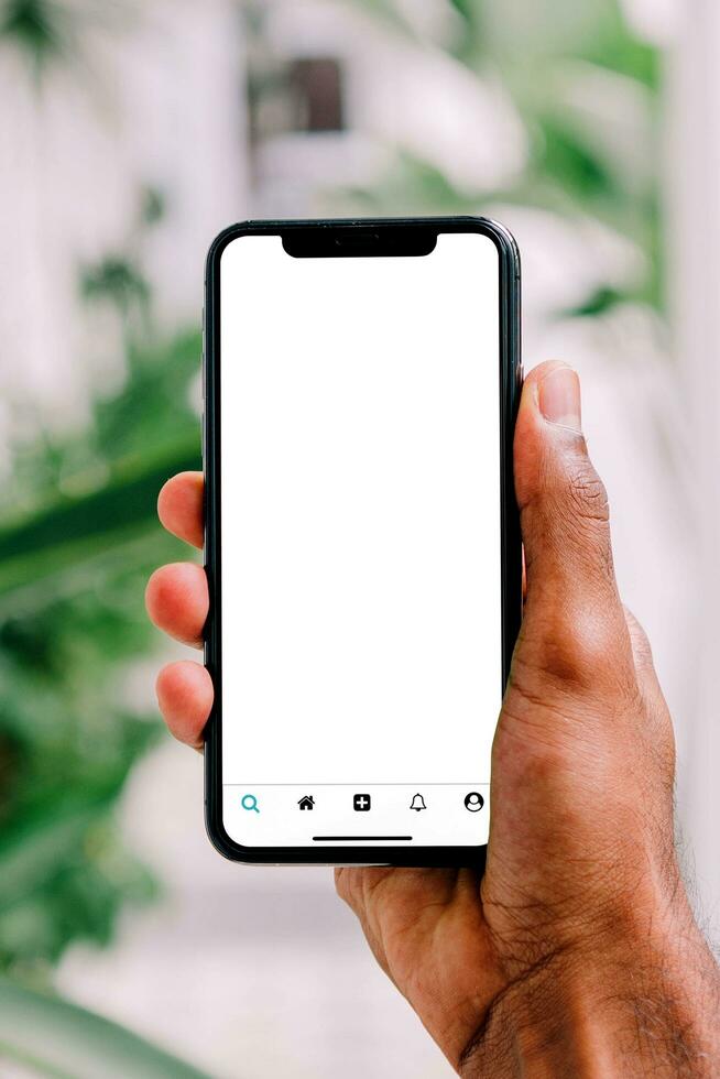Cropped Shot View of Man or Women Hands Holding Smart Phone Mockup v2.0 photo