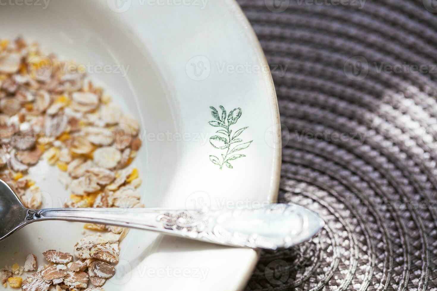 Oatmeal in bowl with nuts, useful food photo