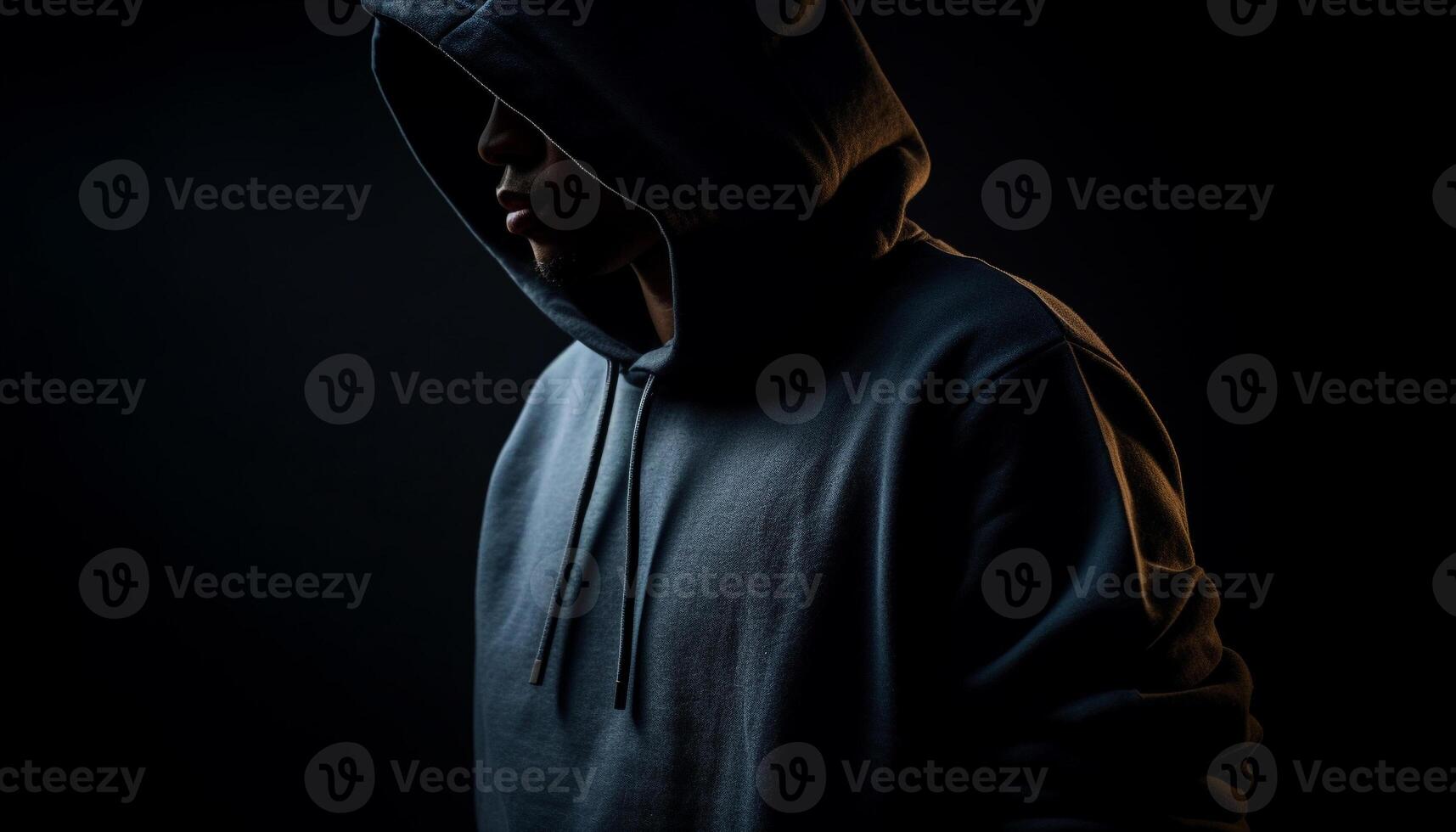 Hooded burglar exercising danger in black solitude generated by AI photo