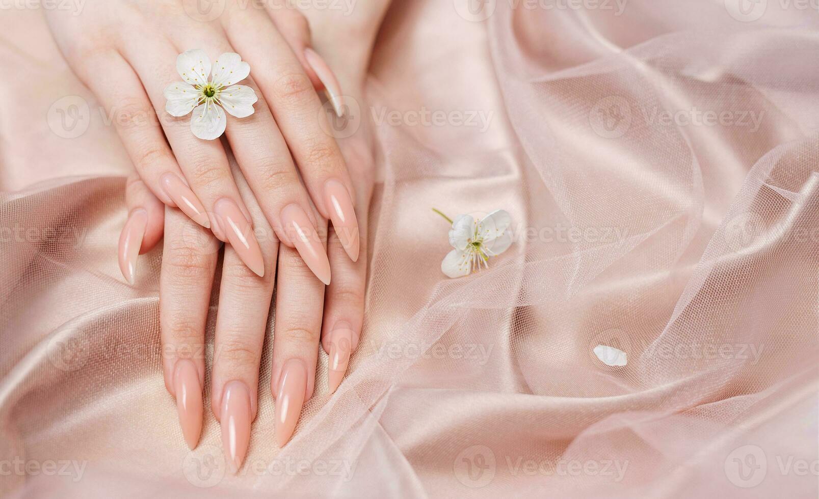 Elegant pastel pink natural manicure. photo