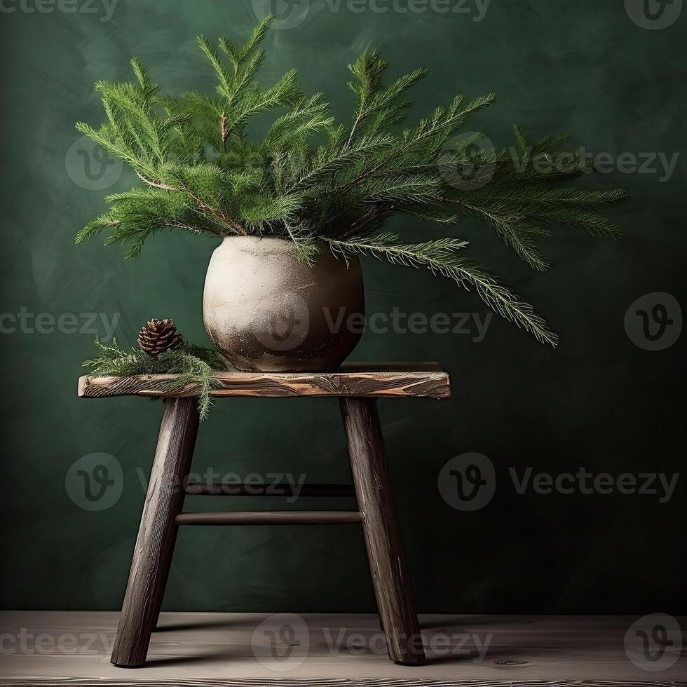 Standing Spruce Branches in Wooden Vase. photo