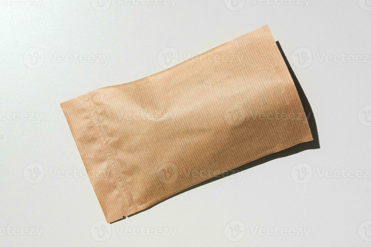 Kraft doy-pack paper bag with zip lock metallized. Space for text, advertising, logo photo