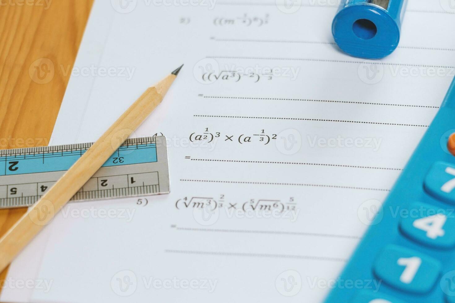 math problems on desk in class photo