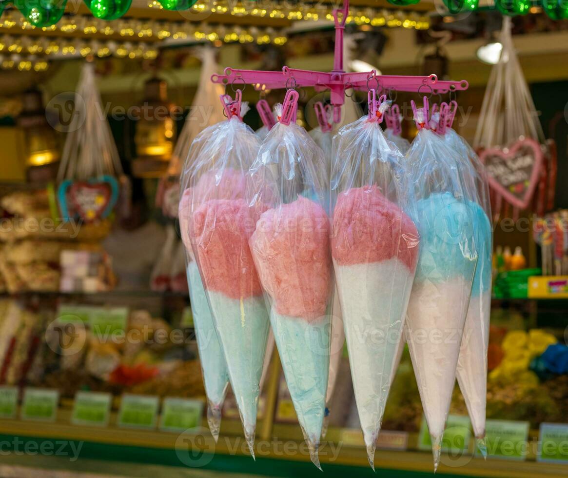 sweet wrapped cotton candy at a candy stand photo