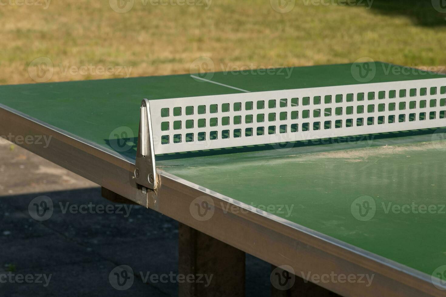 ping pong table in a city park photo