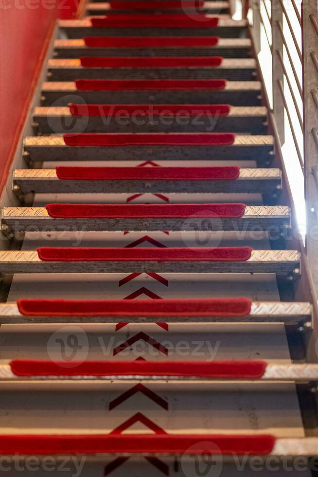 a staircase with red steps photo