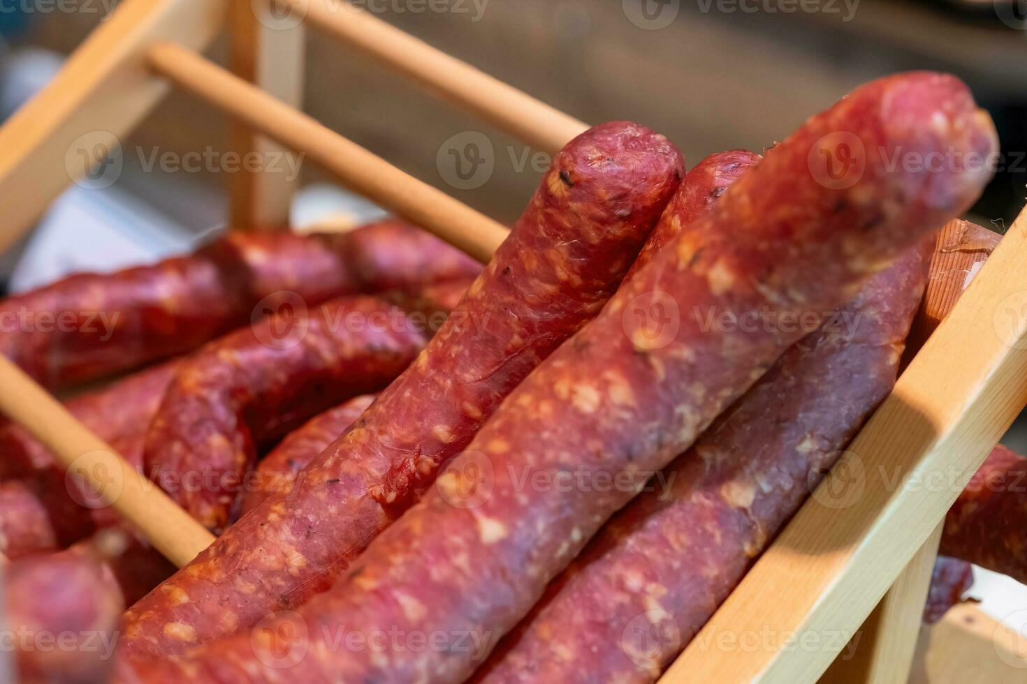 sausage on a wooden shelf photo