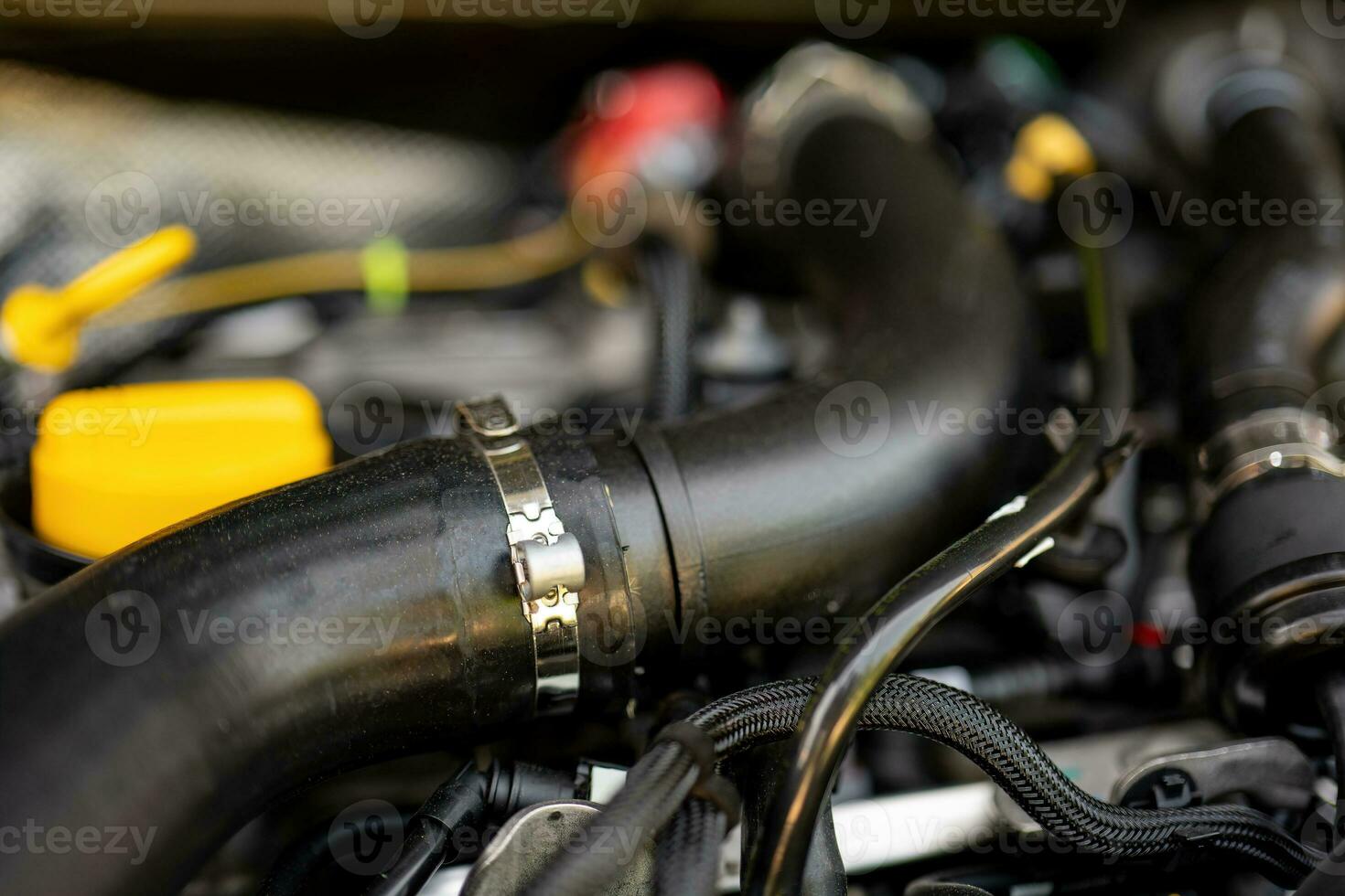 a car engine with hoses photo