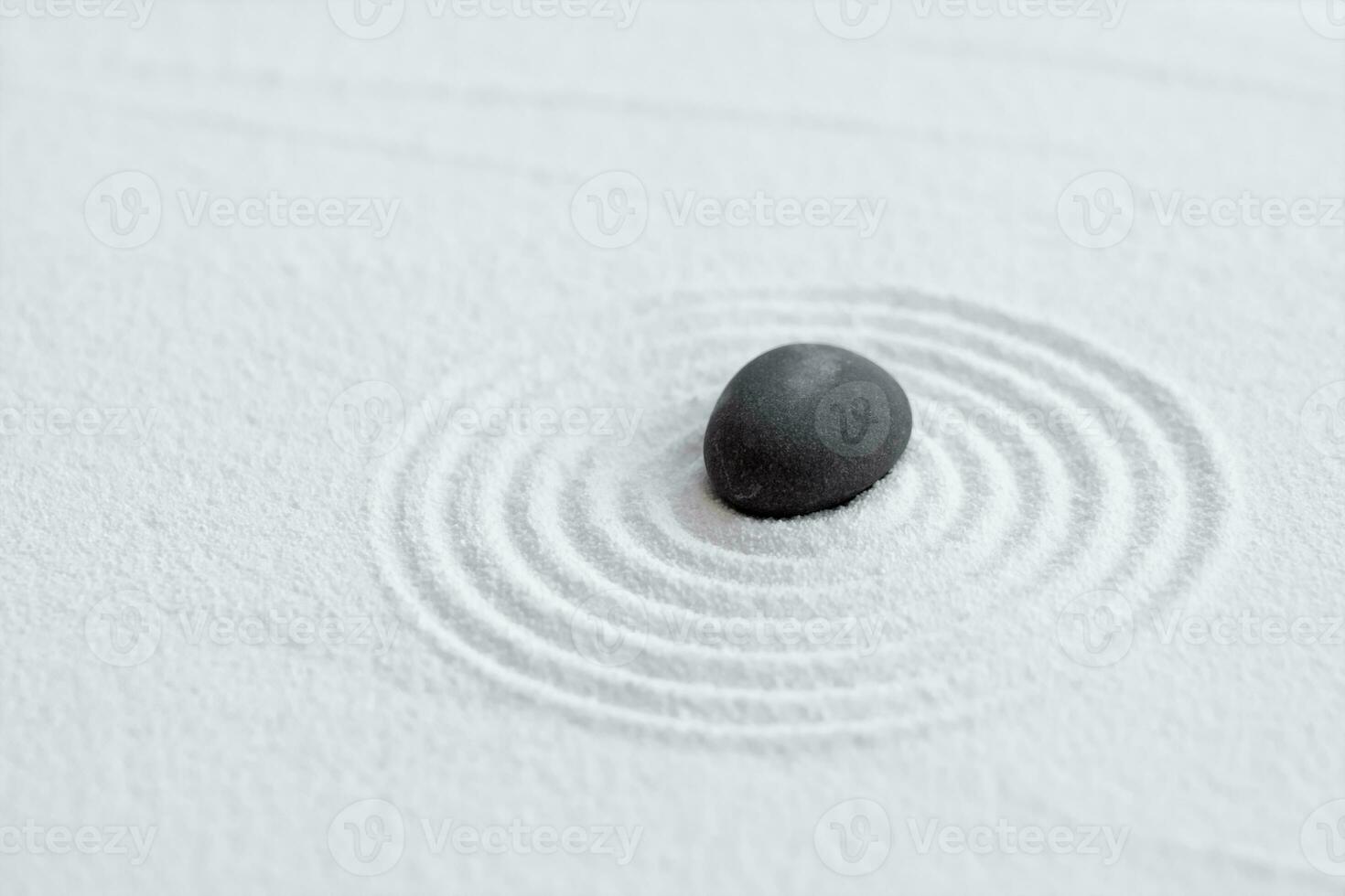 Zen Garden with Grey stone on White Sand Circles Pattern in Japanese stye, Harmony,Meditation,Zen like concept photo