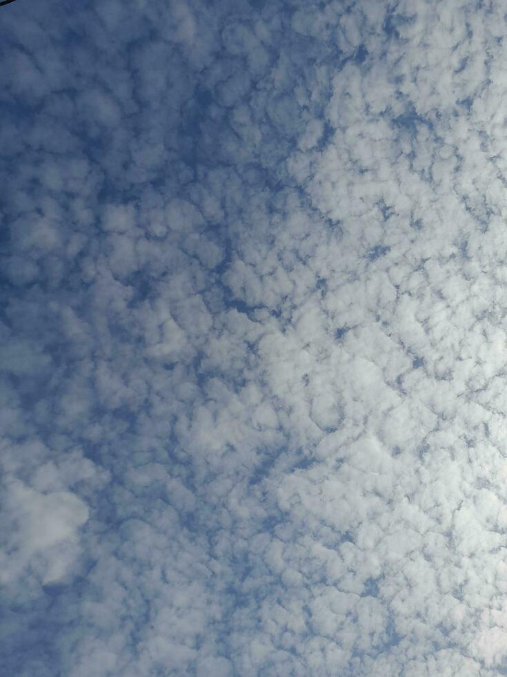The white clouds on the blue sky are perfect for the background.  Skyscape on Lombok Island, Indonesia photo