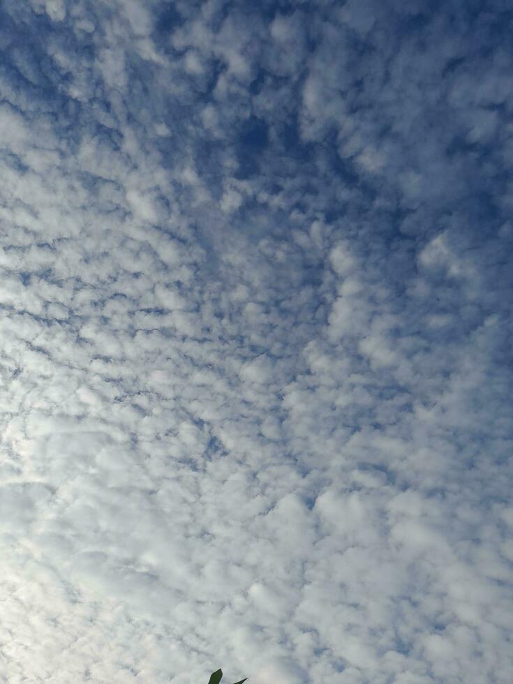 The white clouds on the blue sky are perfect for the background.  Skyscape on Lombok Island, Indonesia photo