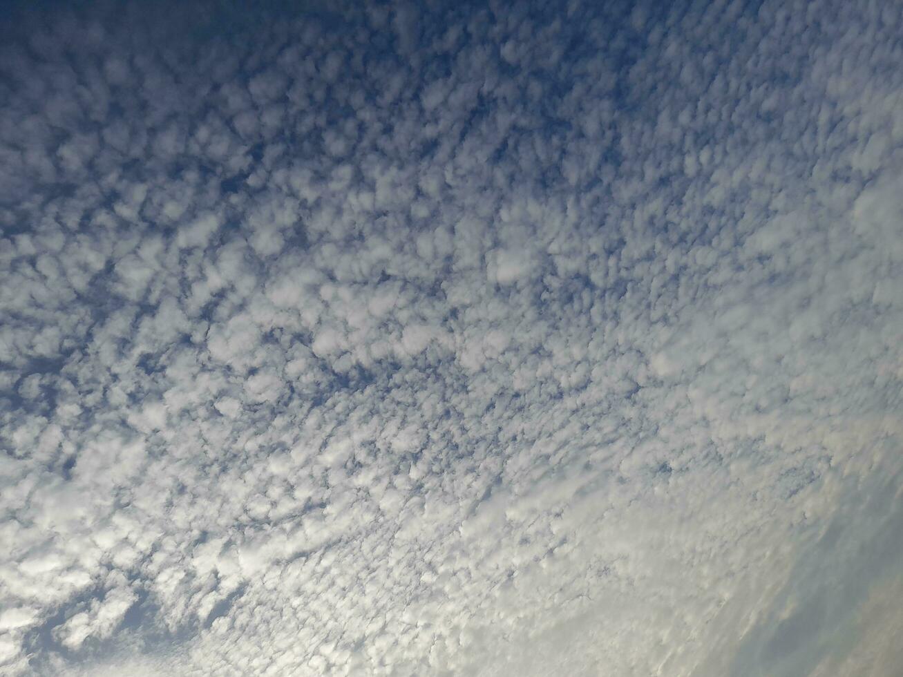 The white clouds on the blue sky are perfect for the background.  Skyscape on Lombok Island, Indonesia photo