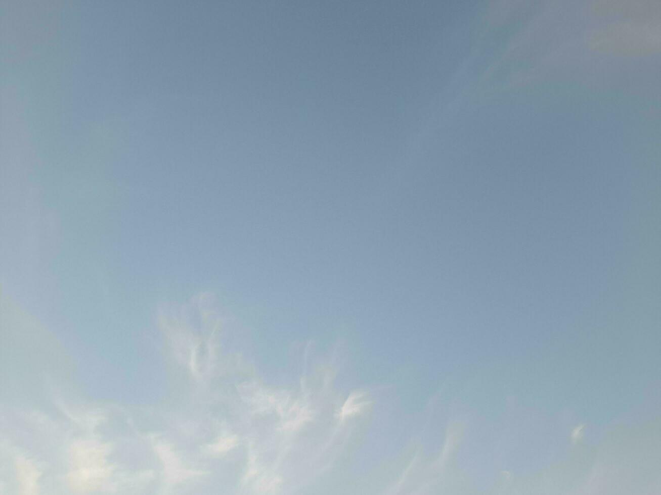 The white clouds on the blue sky are perfect for the background.  Skyscape on Lombok Island, Indonesia photo