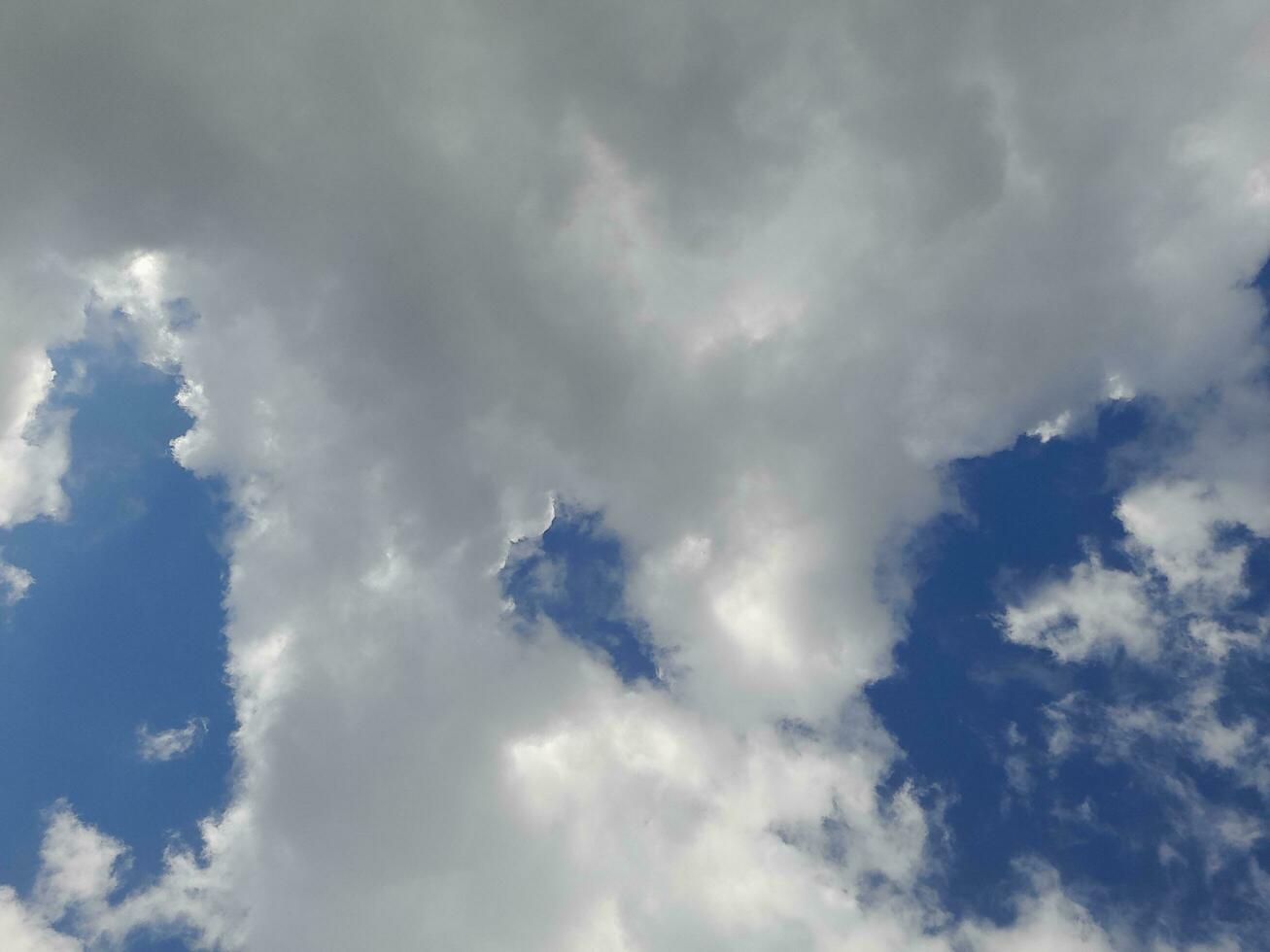 The white clouds on the blue sky are perfect for the background.  Skyscape on Lombok Island, Indonesia photo