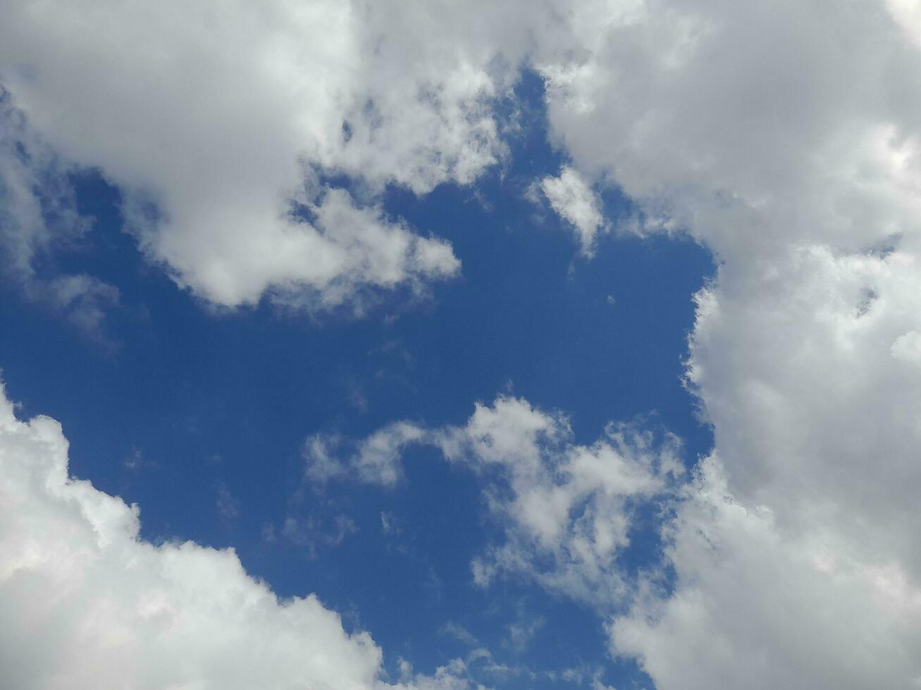 The white clouds on the blue sky are perfect for the background.  Skyscape on Lombok Island, Indonesia photo